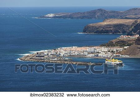 "View of the harbour of Agaete with ferry entering the harbour, Gran Canaria, Canary Islands, Spain, Europe, PublicGround, Europe" View Large Photo Image Stock Image - "View of the harbour of Agaete with ferry entering the harbour, Gran Canaria, Canary Islands, Spain, Europe, PublicGround, Europe". Fotosearch