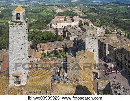 Stock Image - "View of the historic centre from the Torre Grossa tower with the Piazza della Cisterna, church and convent of Sant'Agostino at the back, San Gimignano, Tuscany, Italy, Europe". Fotosearch