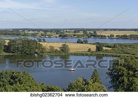 "View of the Mueritz river as seen from the steeple of Marienkirche church, Roebel, Mecklenburg Lake District, Mecklenburg-Western Pomerania, Germany, Europe" View Large Photo Image Picture - "View of the Mueritz river as seen from the steeple of Marienkirche church, Roebel, Mecklenburg Lake District, Mecklenburg-Western Pomerania, Germany, Europe". Fotosearch