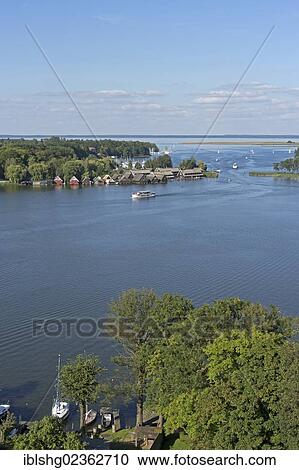 "View of the Mueritz river as seen from the steeple of Marienkirche church, Roebel, Mecklenburg Lake District, Mecklenburg-Western Pomerania, Germany, Europe" View Large Photo Image Stock Image - "View of the Mueritz river as seen from the steeple of Marienkirche church, Roebel, Mecklenburg Lake District, Mecklenburg-Western Pomerania, Germany, Europe". Fotosearch