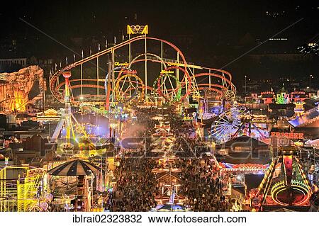 "View of the Oktoberfest festival at night, with illuminated stalls, beer tents and funfair rides, Oktoberfest festival, Munich, Upper Bavaria, Bavaria, Germany, Europe" View Large Photo Image Stock Image - "View of the Oktoberfest festival at night, with illuminated stalls, beer tents and funfair rides, Oktoberfest festival, Munich, Upper Bavaria, Bavaria, Germany, Europe". Fotosearch