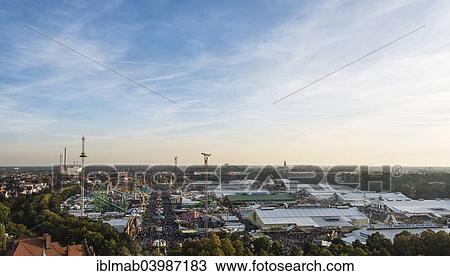 Stock Image - "View of the Oktoberfest, Theresienwiese, Munich, Upper Bavaria, Bavaria, Germany, Europe". Fotosearch