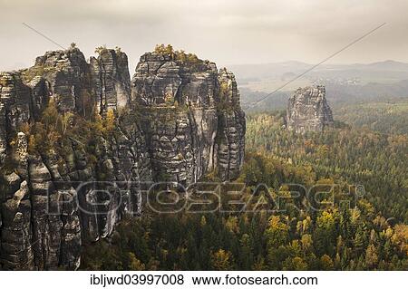 "View of the Schrammstein rocks in the Elbe Sandstone Mountains, Sachsische Schweiz, Saxony, Germany, Europe" View Large Photo Image Stock Photo - "View of the Schrammstein rocks in the Elbe Sandstone Mountains, Sachsische Schweiz, Saxony, Germany, Europe". Fotosearch