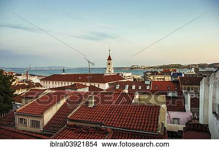 Picture - "View of the Tagus river across the rooftops, Bairro Alto, Lisbon, Portugal, Europe". Fotosearch
