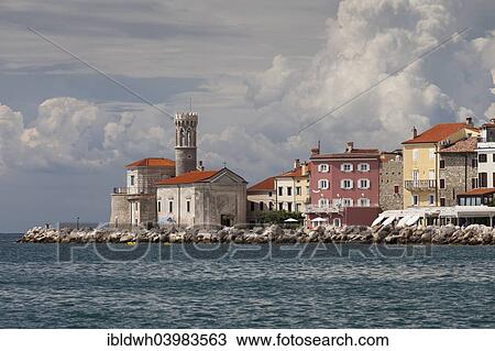 "View of the town of Piran with lighthouse and the Church of Our Lady of Health, St. Clement Church, Piran, Istria, Slovenia, Europe" View Large Photo Image Stock Image - "View of the town of Piran with lighthouse and the Church of Our Lady of Health, St. Clement Church, Piran, Istria, Slovenia, Europe". Fotosearch
