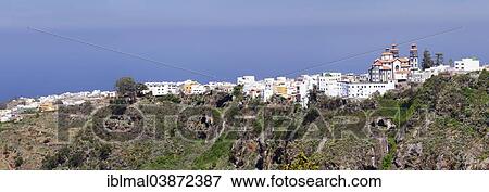 "View of the town with the Church of El Pilar, Moya, Gran Canaria, Canary Islands, Spain, Europe" View Large Photo Image Stock Photo - "View of the town with the Church of El Pilar, Moya, Gran Canaria, Canary Islands, Spain, Europe". Fotosearch