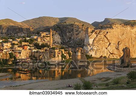 "View of the town with the minaret of the El Rizk Mosque, pillars of the bridge built by the Ortocides, Hasankeyf, Tigris River, Batman Province, Southeastern Anatolia Region, Anatolia, Turkey, Asia" View Large Photo Image Stock Photography - "View of the town with the minaret of the El Rizk Mosque, pillars of the bridge built by the Ortocides, Hasankeyf, Tigris River, Batman Province, Southeastern Anatolia Region, Anatolia, Turkey, Asia". Fotosearch