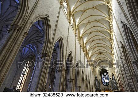 Stock Image - "View of the vaulted ceiling in the nave, reticulated vault, starry sky in the side aisle, Interior, Ulm Minster, Ulm, Baden-Wuerttemberg, Germany, Europe". Fotosearch