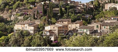 "View of the village of Deia, Sierra de Tramontana, Majorca, Balearic Islands, Spain, Europe" View Large Photo Image Stock Photo - "View of the village of Deia, Sierra de Tramontana, Majorca, Balearic Islands, Spain, Europe". Fotosearch