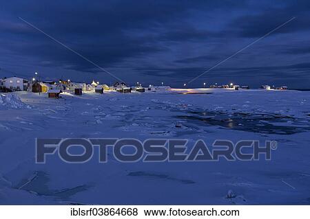 Stock Photo - "View of the village of Skallelv at dusk, blue hour, Skallelv, Vadso, Finnmark, Norway, Europe". Fotosearch
