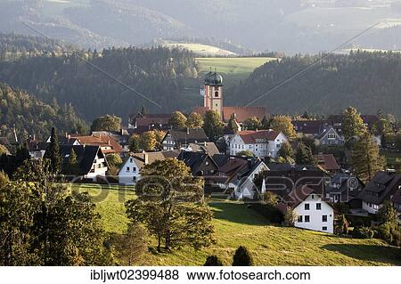 Stock Photo - "View of the village of St Maergen with the monastery church in the evening light, Black Forest, Baden-Wuerttemberg, Germany, Europe". Fotosearch