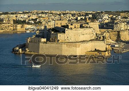 "View of Valletta of the fortress Fort St. Angelo in the centre of the Grand Harbour, Vittoriosa, Malta, Europe" View Large Photo Image Stock Photo - "View of Valletta of the fortress Fort St. Angelo in the centre of the Grand Harbour, Vittoriosa, Malta, Europe". Fotosearch