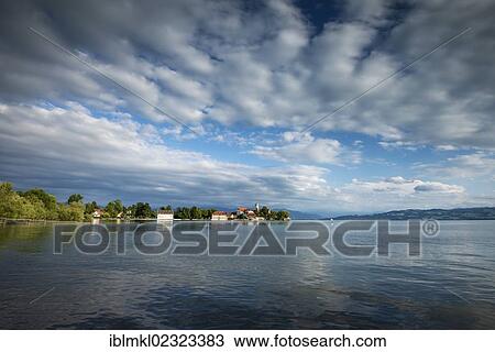 "View of Wasserburg peninsula with the baroque church of St. George as seen from the town of Nonnenhorn, Lake Constance, Bavaria, Germany, Europe" View Large Photo Image Stock Image - "View of Wasserburg peninsula with the baroque church of St. George as seen from the town of Nonnenhorn, Lake Constance, Bavaria, Germany, Europe". Fotosearch