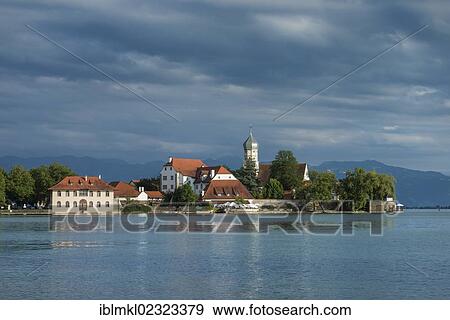 Stock Photo - "View of Wasserburg peninsula with the baroque church of St. George as seen from the town of Nonnenhorn, Lake Constance, Bavaria, Germany, Europe". Fotosearch
