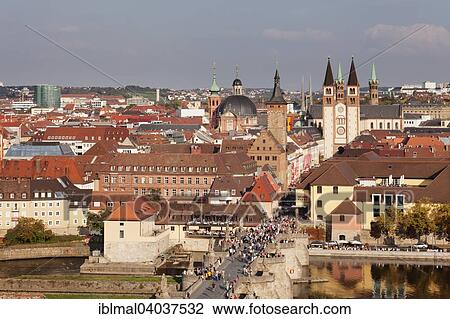 "View of Wurzburg with Old Main bridge, St. Augustine's Church, Neumunster collegiate church, Grafeneckart City Hall and Wurzburg Cathedral, Wurzburg, Lower Franconia, Bavaria, Germany, Europe" View Large Photo Image Stock Image - "View of Wurzburg with Old Main bridge, St. Augustine's Church, Neumunster collegiate church, Grafeneckart City Hall and Wurzburg Cathedral, Wurzburg, Lower Franconia, Bavaria, Germany, Europe". Fotosearch
