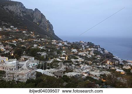 "View over Capri with Monte Solaro at dusk, Capri, Campania, Italy, Europe" View Large Photo Image Stock Photo - "View over Capri with Monte Solaro at dusk, Capri, Campania, Italy, Europe". Fotosearch