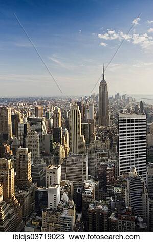 "View over downtown Manhattan and the Empire State Building from the Rockefeller Center, Manhattan, New York City, New York, United States, North America" View Large Photo Image Stock Image - "View over downtown Manhattan and the Empire State Building from the Rockefeller Center, Manhattan, New York City, New York, United States, North America". Fotosearch