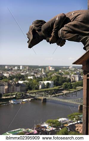 "View over Frankfurt with the Main River, overlooking the Museum Embankment, Sachsenhausen, with a gargoyle from the facade of the Imperial Cathedral at the front, Frankfurt, Hesse, Germany, Europe" View Large Photo Image Stock Photo - "View over Frankfurt with the Main River, overlooking the Museum Embankment, Sachsenhausen, with a gargoyle from the facade of the Imperial Cathedral at the front, Frankfurt, Hesse, Germany, Europe". Fotosearch