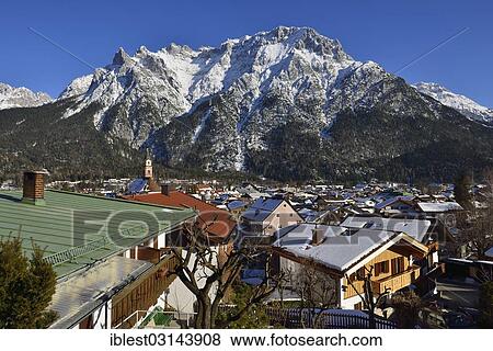 "View over Mittenwald and Karwendel Mountains, Werdenfelser Land, Mittenwald, Upper Bavaria, Bavaria, Germany, Europe" View Large Photo Image Stock Photo - "View over Mittenwald and Karwendel Mountains, Werdenfelser Land, Mittenwald, Upper Bavaria, Bavaria, Germany, Europe". Fotosearch