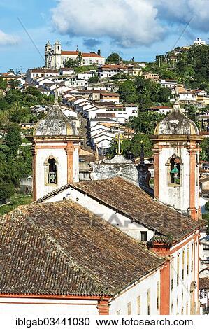 Stock Image - "View over Santa Efigenia Church and Nossa Senhora do Conceicao Church in the historic centre of Ouro Preto, a UNESCO World Heritage Site, Ouro Preto, Minas Gerais, Brazil, South America". Fotosearch