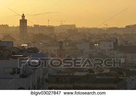 Stock Photo - "View over the city at dusk, Agadir, Souss-Massa-Draa region, Morocco, Africa". Fotosearch