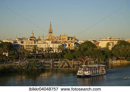 "View over the Guadalquivir to the bullring and the cathedral, Seville, Andalucia, Spain, Europe" View Large Photo Image Stock Photo - "View over the Guadalquivir to the bullring and the cathedral, Seville, Andalucia, Spain, Europe". Fotosearch