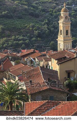 Picture - "View over the red rooftops of Vallebona with the Church of San Lorenzo, Vallebona, Liguria, Italy, Europe". Fotosearch