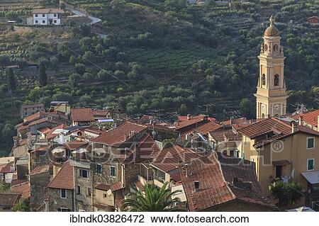 Stock Image - "View over the red rooftops of Vallebona with the Church of San Lorenzo, Vallebona, Liguria, Italy, Europe". Fotosearch