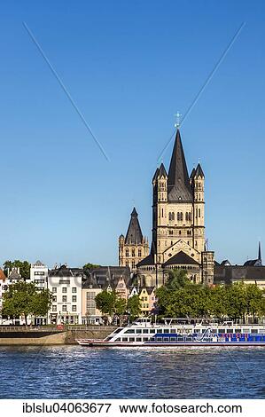 Stock Photo - "View over the Rhine of the historic centre with Great St. Martin Church and City Hall, Cologne, North Rhine-Westphalia, Germany, Europe". Fotosearch