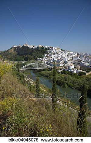 "View over the Rio Guadalete on the old town of Arcos de la Frontera, Andalusia, Spain, Europe" View Large Photo Image Stock Photo - "View over the Rio Guadalete on the old town of Arcos de la Frontera, Andalusia, Spain, Europe". Fotosearch