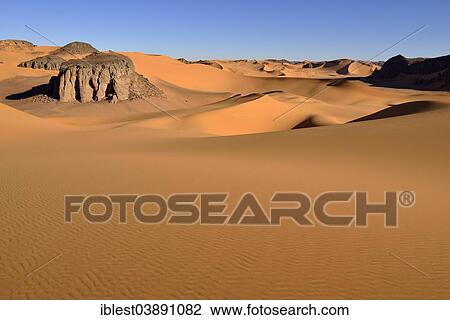 "View over the sand dunes and rocks of Moul Naga, Tadrart, Tassili n'Ajjer National Park, Unesco World Heritage Site, Sahara, Algeria, Africa" View Large Photo Image Stock Image - "View over the sand dunes and rocks of Moul Naga, Tadrart, Tassili n'Ajjer National Park, Unesco World Heritage Site, Sahara, Algeria, Africa". Fotosearch