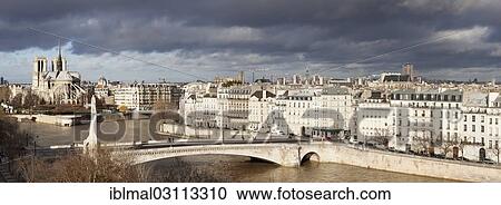 "View over the Seine River towards Ile de la Cite with Notre-Dame de Paris Cathedral, Paris, Ile-de-France, France, Europe" View Large Photo Image Stock Image - "View over the Seine River towards Ile de la Cite with Notre-Dame de Paris Cathedral, Paris, Ile-de-France, France, Europe". Fotosearch