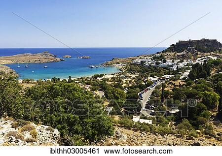 "View over the town of Lindos, with the Acropolis at the rear, Lindos, Rhodos Island, Dodecanese, Greece, Europe" View Large Photo Image Stock Image - "View over the town of Lindos, with the Acropolis at the rear, Lindos, Rhodos Island, Dodecanese, Greece, Europe". Fotosearch