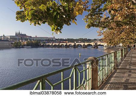 Stock Photo - "View over the Vltava River to Charles Bridge and Hradcany, Castle District, with St. Vitus Cathedral, Prague, Bohemia, Czech Republic, Europe". Fotosearch