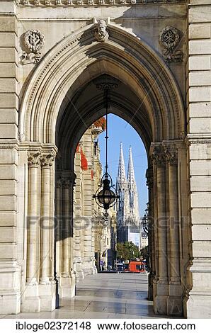 "View through an arch of the Town Hall towards Votive Church, Vienna, Austria, Europe" View Large Photo Image Stock Photo - "View through an arch of the Town Hall towards Votive Church, Vienna, Austria, Europe". Fotosearch