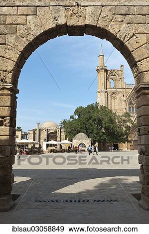 Stock Photo - "View through an archway towards a minaret and tower, Lala Mustafa Pasha Mosque, former St. Nikolaos Cathedral, historic center, Famagusta, Gazimagusa, Ammochostos, Turkische Republik Nordzypern, Cyprus, Europe". Fotosearch