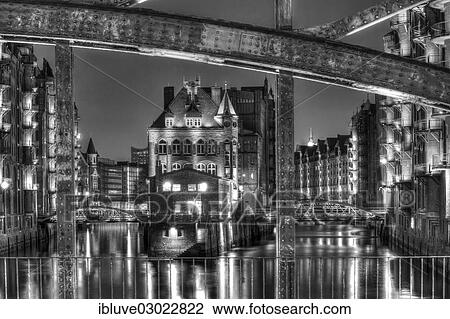 "View through Poggenmuehlenbruecke bridge towards Wasserschloesschen water castle at night, Speicherstadt, Hamburg, Hamburg, Germany, Europe" View Large Photo Image Stock Image - "View through Poggenmuehlenbruecke bridge towards Wasserschloesschen water castle at night, Speicherstadt, Hamburg, Hamburg, Germany, Europe". Fotosearch