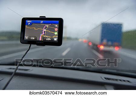 "View through the windscreen of a car, satnav device, Germany, Europe" View Large Photo Image Picture - "View through the windscreen of a car, satnav device, Germany, Europe". Fotosearch