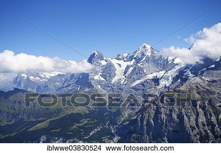 "View towards Eiger and Jungfrau mountains, Bernese Alps, World Natural Heritage site of Jungfrau-Aletsch-Bietschhorn, Murren, Bernese Oberland, Canton of Bern, Switzerland, Europe" View Large Photo Image Picture - "View towards Eiger and Jungfrau mountains, Bernese Alps, World Natural Heritage site of Jungfrau-Aletsch-Bietschhorn, Murren, Bernese Oberland, Canton of Bern, Switzerland, Europe". Fotosearch