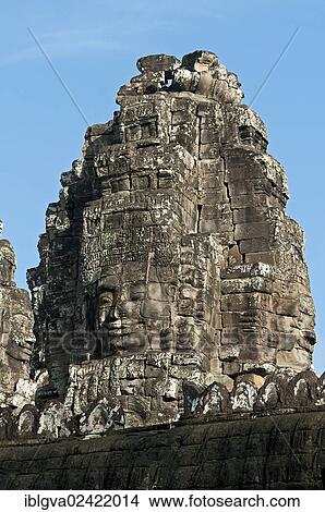 View towards one of the more than 50 mystical towers of Bayon Temple with huge carved stone faces, Bayon, Angkor Thom, Siem Reap, Cambodia, Southeast Asia, Asia View Large Photo Image Picture - View towards one of the more than 50 mystical towers of Bayon Temple with huge carved stone faces, Bayon, Angkor Thom, Siem Reap, Cambodia, Southeast Asia, Asia. Fotosearch