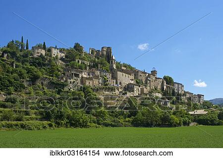 "View towards the village of Montbrun-les-Bains, Montbrun-les-Bains, Rhone-Alpes, France, Europe" View Large Photo Image Picture - "View towards the village of Montbrun-les-Bains, Montbrun-les-Bains, Rhone-Alpes, France, Europe". Fotosearch