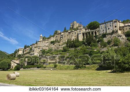 Picture - "View towards the village of Montbrun-les-Bains, Montbrun-les-Bains, Rhone-Alpes, France, Europe". Fotosearch