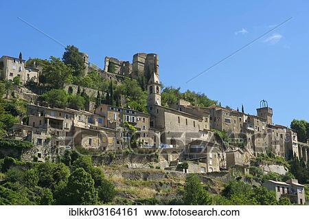Stock Image - "View towards the village of Montbrun-les-Bains, Montbrun-les-Bains, Rhone-Alpes, France, Europe". Fotosearch