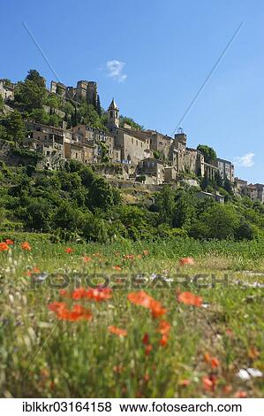 Stock Photo - "View towards the village of Montbrun-les-Bains, Montbrun-les-Bains, Rhone-Alpes, France, Europe". Fotosearch