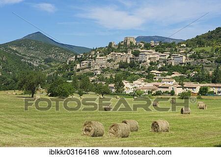 Stock Photo - "View towards the village of Montbrun-les-Bains, Montbrun-les-Bains, Rhone-Alpes, France, Europe". Fotosearch
