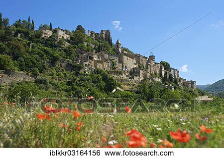 "View towards the village of Montbrun-les-Bains, Montbrun-les-Bains, Rhone-Alpes, France, Europe" View Large Photo Image Stock Photograph - "View towards the village of Montbrun-les-Bains, Montbrun-les-Bains, Rhone-Alpes, France, Europe". Fotosearch