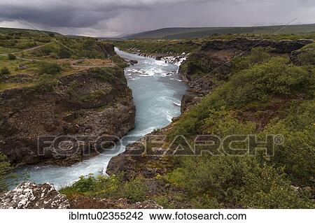 "View towards the west over Hraunfossar waterfall, West Iceland, Iceland, Europe" View Large Photo Image Stock Image - "View towards the west over Hraunfossar waterfall, West Iceland, Iceland, Europe". Fotosearch