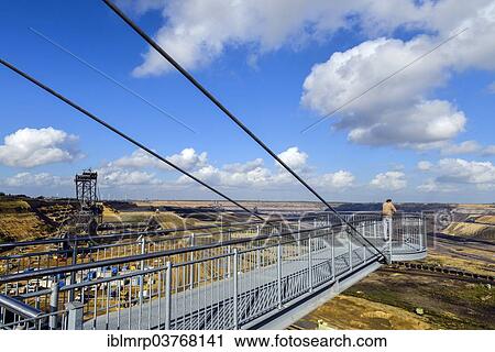 Stock Image - "Viewing platform, Garzweiler II mining area, open-cast lignite mine, Garzweiler, Juechen, North Rhine-Westphalia, Germany, Europe". Fotosearch