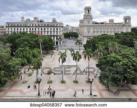 Stock Photo - "Views of Central Park, Parque Central, on Paseo de Marti, at the back Manzana de Gomez and Museo Nacional de Bellas Artes in the Palacio del Centro Asturiano, art museum, Centro Habana, Havana, Ciudad de La Habana, Cuba, North America". Fotosearch