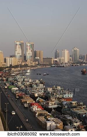 "Views over Dubai Creek with traditional wooden boats known as dhow, Dubai, Emirate of Dubai, United Arab Emirates, Asia" View Large Photo Image Stock Image - "Views over Dubai Creek with traditional wooden boats known as dhow, Dubai, Emirate of Dubai, United Arab Emirates, Asia". Fotosearch